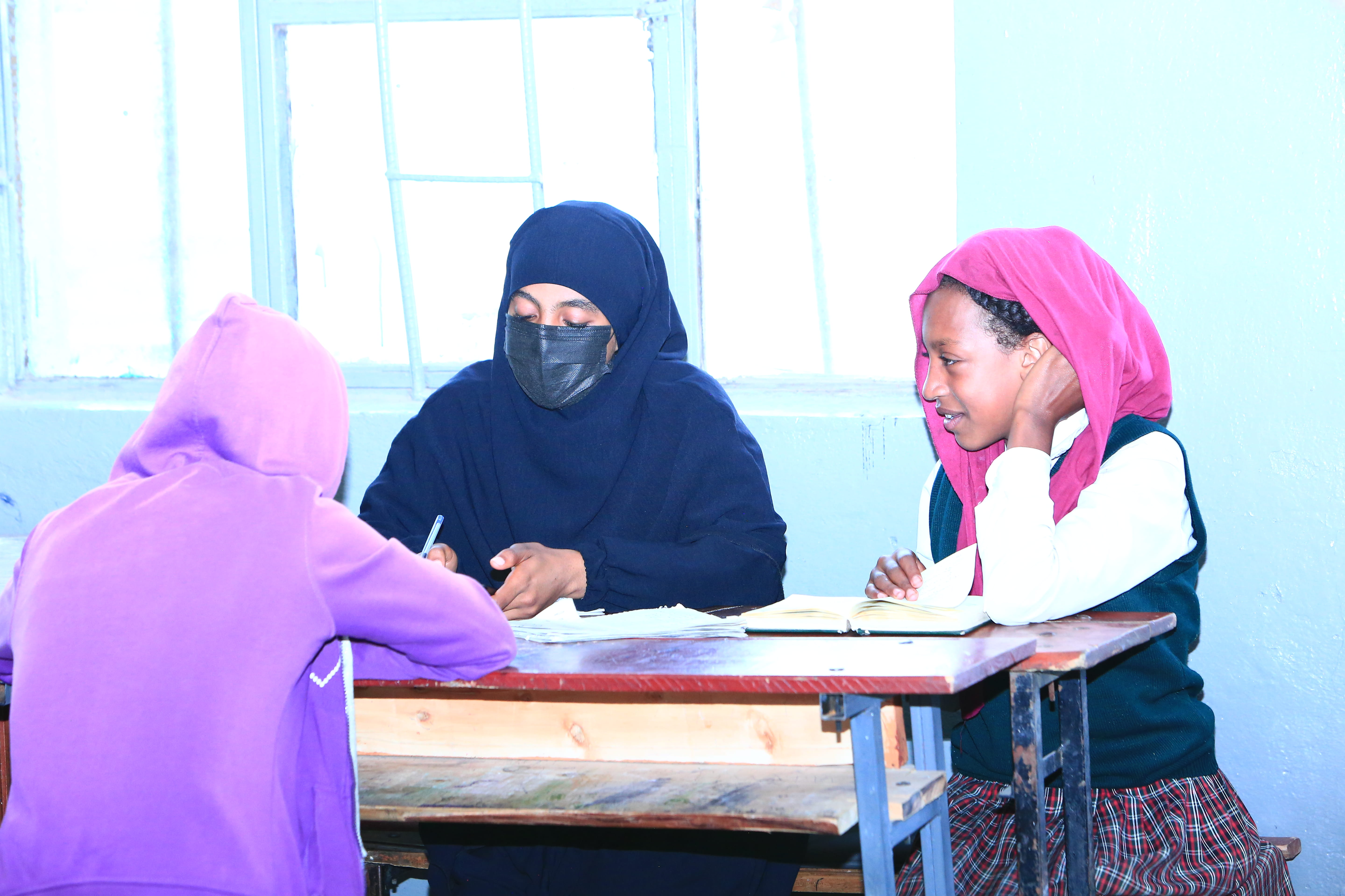 Women participating in educational activities